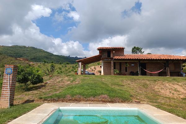 HUASANO, SE VENDE GRAN TERRENO DE PRODUCCION CON CASA CAMPESTRE